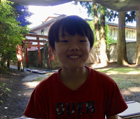 boy at Kiyotaka Inari Shrine